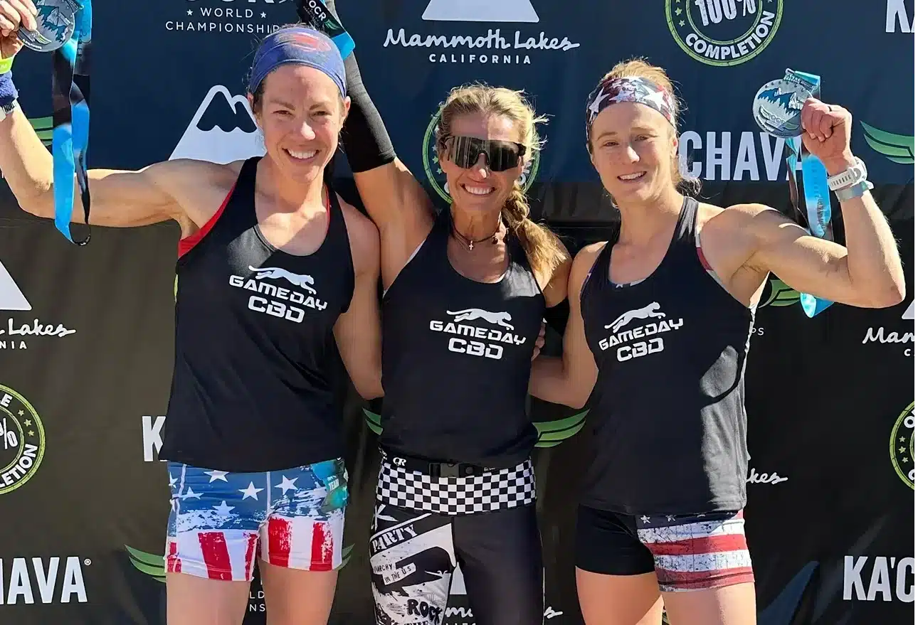 Physical therapist assisting patient with mobility exercises using cbd topical product