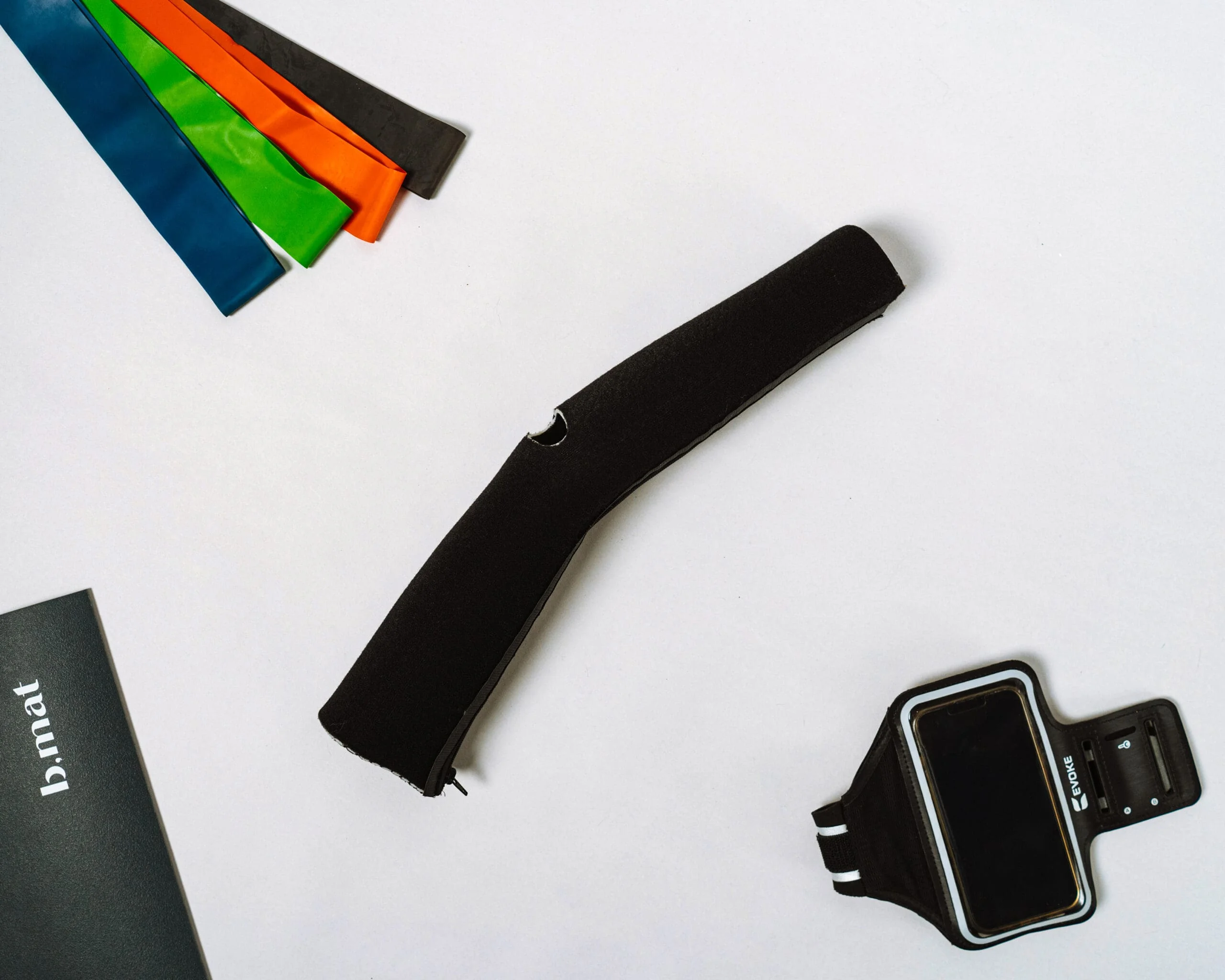 Patient confidently trying on Turtlebrace orthotic brace with clinician assistance in modern hospital setting