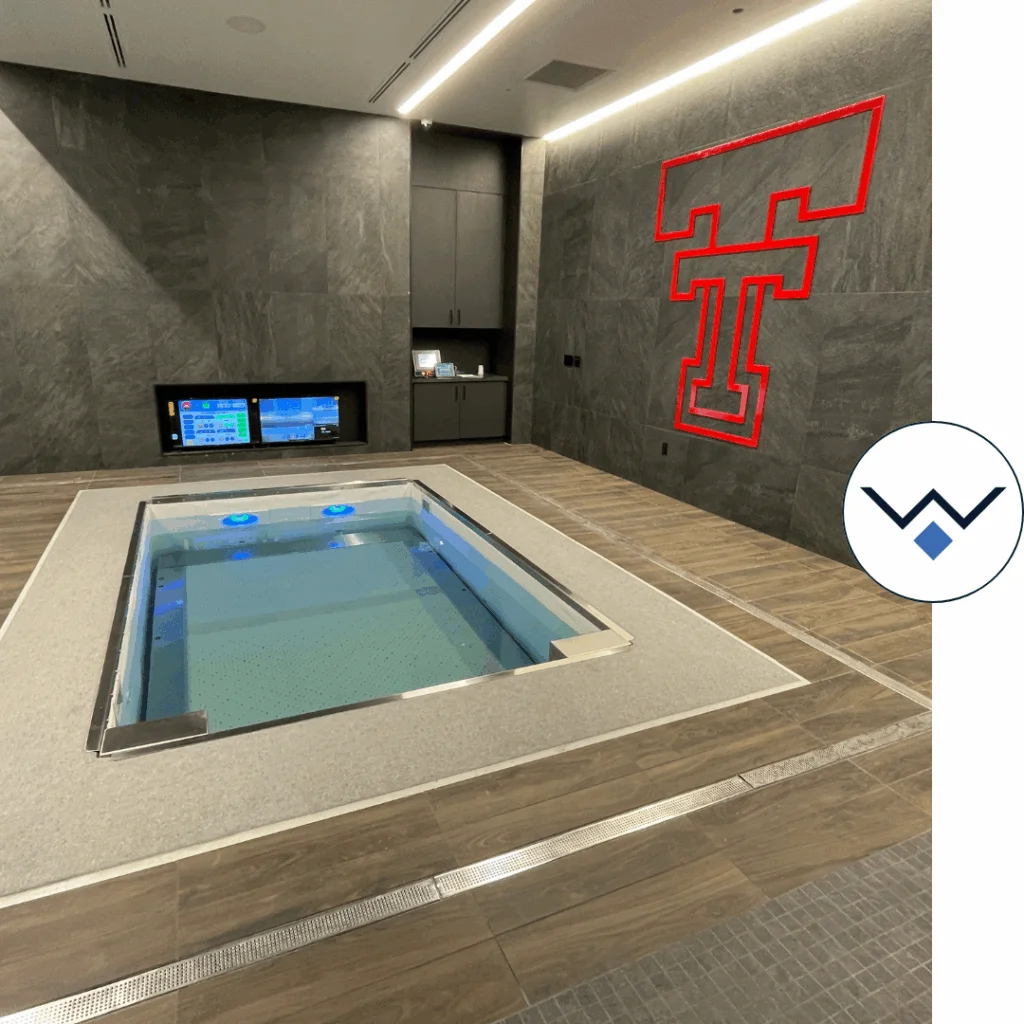 Patients undergoing aquatic therapy on HydroWorx underwater treadmill in a physical therapy clinic