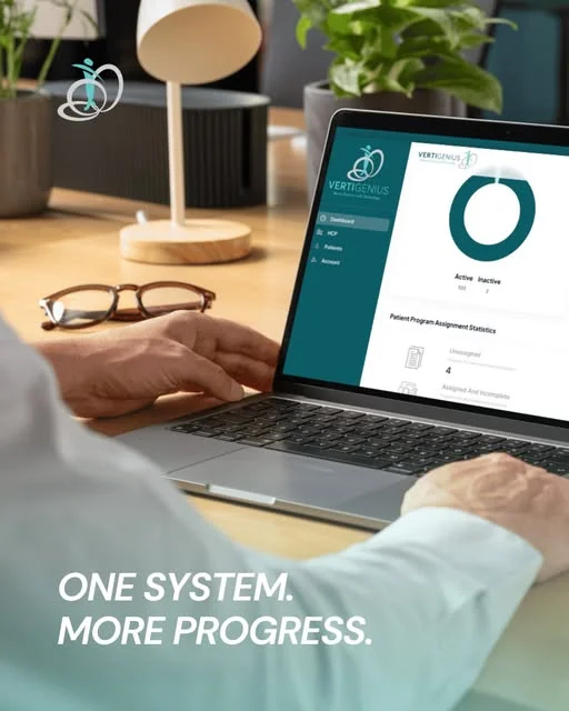 remote therapeutic monitoring data dashboard—clinician reviewing patient progress and symptom trends