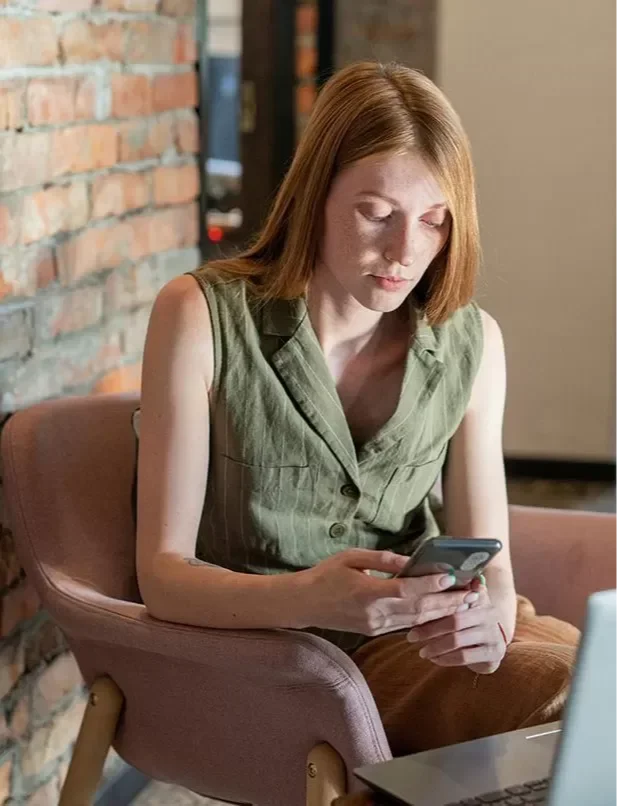 future of business texting showing SMS integration with email and spreadsheets in a modern office